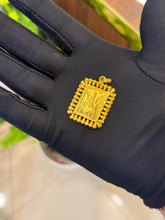 22-Karat Pendant.