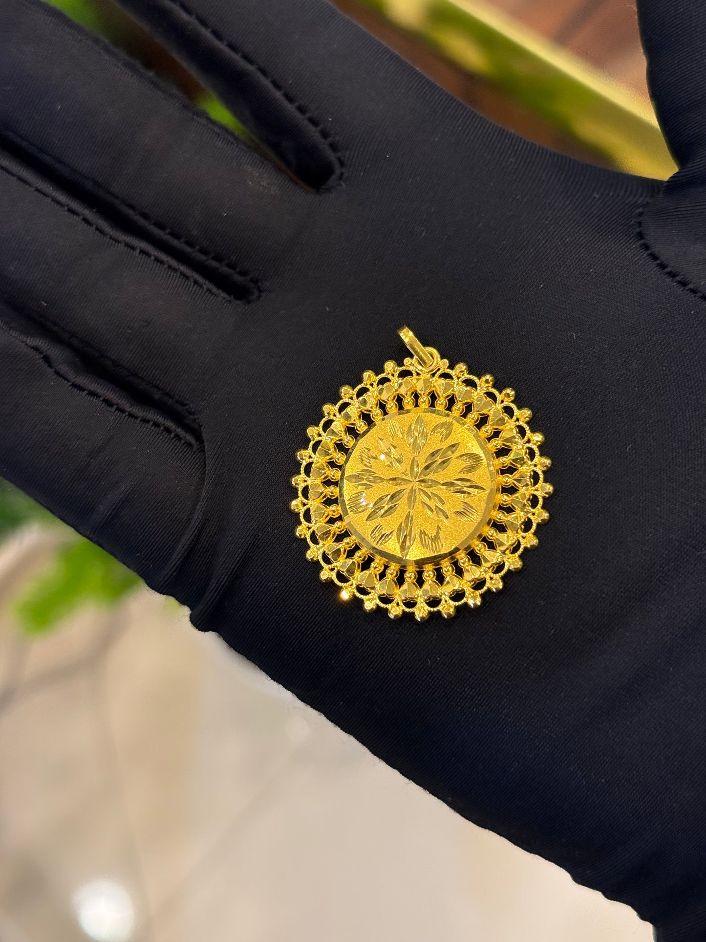 22-Karat Pendant.