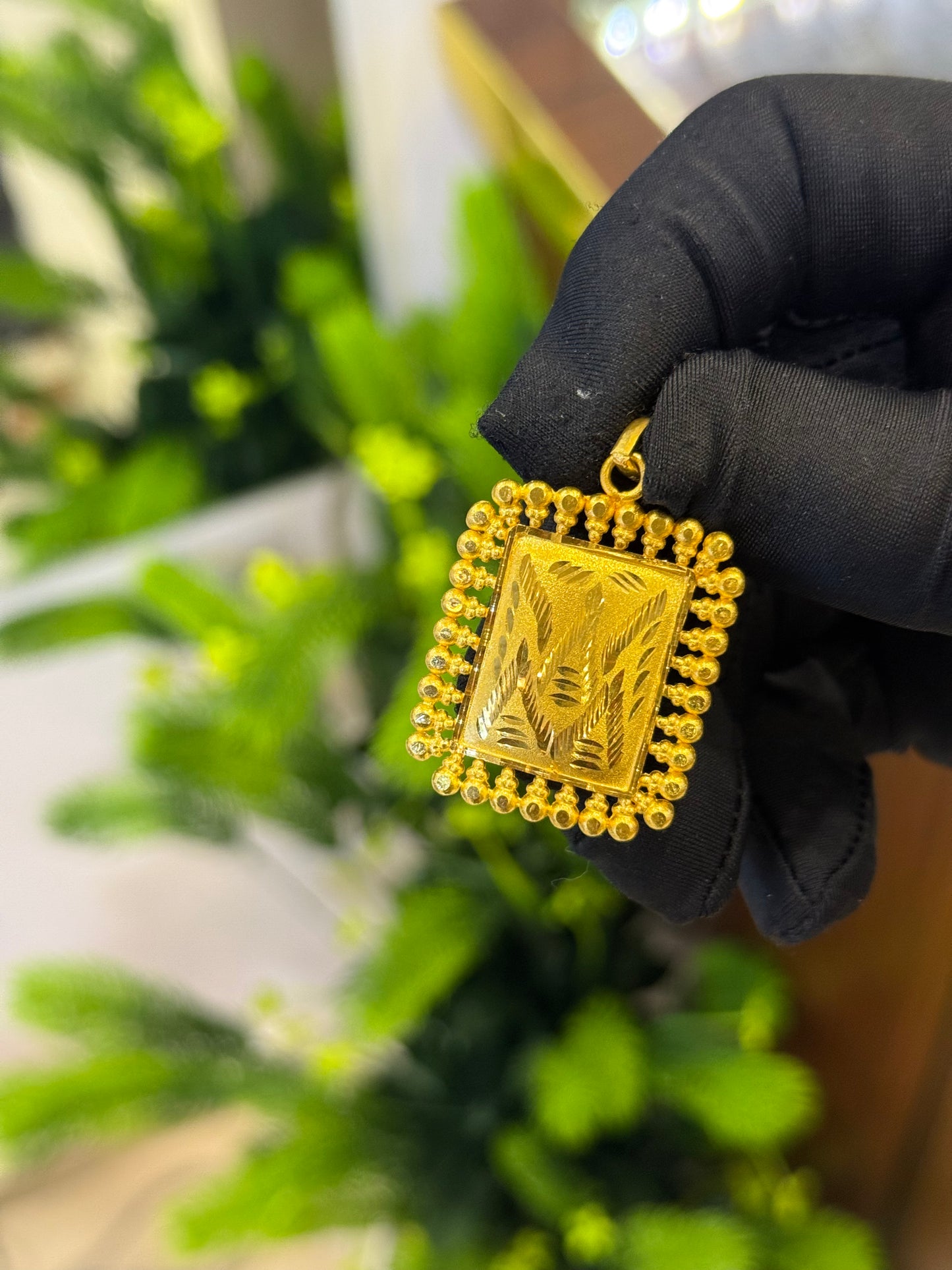 22-Karat Pendant.